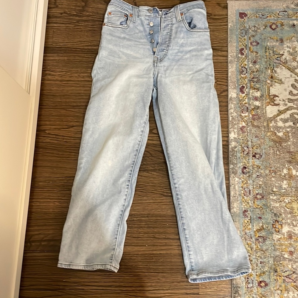 Ribcage straight light wash size 25